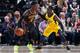 INDIANAPOLIS, IN - MARCH 09: Dennis Schroder #17 of the Atlanta Hawks handles the ball against Darren Collison #2 of the Indiana Pacers during a game at Bankers Life Fieldhouse on March 9, 2018 in Indianapolis, Indiana. The Pacers won 112-87. NOTE TO USER