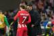 MADRID, SPAIN - APRIL 05: Antoine Griezmann of Atletico Madrid speaks with Head coach Diego Simeone of Atletico Madrid during the UEFA Europa League quarter final leg one match between Atletico Madrid and Sporting CP at Wanda Metropolitano on April 5, 201