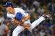 LOS ANGELES, CA - MAY 10: Walker Buehler #21 of the Los Angeles Dodgers pitches in the game against the Cincinnati Reds at Dodger Stadium on May 10, 2018 in Los Angeles, California. (Photo by Jayne Kamin-Oncea/Getty Images)