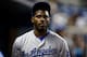 MIAMI, FL - MAY 17: Yasiel Puig #66 of the Los Angeles Dodgers looks on in the dugout against the Miami Marlins at Marlins Park on May 17, 2018 in Miami, Florida. (Photo by Michael Reaves/Getty Images)