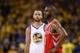 OAKLAND, CA - MAY 20: Stephen Curry #30 of the Golden State Warriors and Chris Paul #3 of the Houston Rockets stand on the court during Game Three of the Western Conference Finals of the 2018 NBA Playoffs at ORACLE Arena on May 20, 2018 in Oakland, Calif