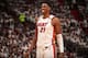 MIAMI, FL - APRIL 21: Hassan Whiteside #21 of the Miami Heat looks on in Game Four of the Eastern Conference Quarterfinals against the Philadelphia 76ers during the 2018 NBA Playoffs on April 21, 2018 at American Airlines Arena in Miami, Florida. NOTE TO