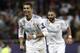 Real Madrid's Portuguese forward Cristiano Ronaldo (L) cele brates after Real Madrid's Welsh forward Gareth Bale scored a goal during the UEFA Champions League final football match between Liverpool and Real Madrid at the Olympic Stadium in Kiev, Ukraine