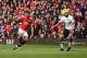 Manchester United's English striker Marcus Rashford (L) scores the opening goal during the English Premier League football match between Manchester United and Liverpool at Old Trafford in Manchester, north west England, on March 10, 2018. / AFP PHOTO / Ol