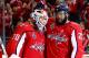 WASHINGTON, DC - JUNE 04: Braden Holtby #70 and Devante Smith-Pelly #25 of the Washington Capitals celebrate their team's 6-2 win over the Vegas Golden Knights in Game Four of the 2018 NHL Stanley Cup Final at Capital One Arena on June 4, 2018 in Washing