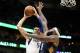 NEW ORLEANS, LA - DECEMBER 29: Salah Mejri #50 of the Dallas Mavericks shoots the ball over DeMarcus Cousins #0 of the New Orleans Pelicans at Smoothie King Center on December 29, 2017 in New Orleans, Louisiana. (Photo by Chris Graythen/Getty Images)