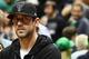 MILWAUKEE, WI - APRIL 20: Quarterback Aaron Rodgers of the Green Bay Packers watches action during game three of round one of the Eastern Conference playoffs between the Milwaukee Bucks and the Boston Celtics at the Bradley Center on April 20, 2018 in Mi