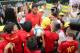 Belgium's forward Eden Hazard signs autographs of pupils of the Ecole Fondamentale de Clabecq in Clabecq, Belgium on June 8, 2018. - The Red Devils visit ten schools all over the country before participating in the upcoming FIFA World Cup 2018 in Russia.