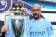 MANCHESTER, ENGLAND - MAY 06: Josep Guardiola, Manager of Manchester City poses with The Premier League Trophy after the Premier League match between Manchester City and Huddersfield Town at Etihad Stadium on May 6, 2018 in Manchester, England. (Photo b