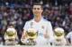 MADRID, SPAIN - DECEMBER 09: Cristiano Ronaldo of Real Madrid poses for photos with his FIFA Ballon Dor Trophies prior to the La Liga 2017-18 match between Real Madrid and Sevilla FC at Santiago Bernabeu Stadium on 09 December 2017 in Madrid, Spain. (Phot
