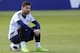 Argentina's forward Lionel Messi looks on as he sits on a ball during a training session of Argentina's national football team at the team's base camp in Bronnitsy, near Moscow, on June 11, 2018 ahead of the Russia 2018 World Cup football tournament. (Pho