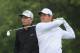 SOUTHAMPTON, NY - JUNE 13: Rory McIlroy of Northern Ireland his a shot as Aaron Wise of the United States looks on during a practice round prior to the 2018 U.S. Open at Shinnecock Hills Golf Club on June 13, 2018 in Southampton, New York. (Photo by And