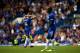 LONDON, ENGLAND - AUGUST 12: Cesc Fabregas of Chelsea leaves the field dejected after being shown a red card by Referee, Craig Pawson during the Premier League match between Chelsea and Burnley at Stamford Bridge on August 12, 2017 in London, England. (P