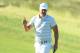 SOUTHAMPTON, NY - JUNE 14: Brooks Koepka of the United States waves after making a birdie on the first hole during the first round of the 2018 U.S. Open at Shinnecock Hills Golf Club on June 14, 2018 in Southampton, New York. (Photo by Andrew Redington/