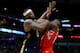 NEW ORLEANS, LA - JANUARY 26: DeMarcus Cousins #0 of the New Orleans Pelicans fights for a loose ball with Clint Capela #15 of the Houston Rockets during the second half at the Smoothie King Center on January 26, 2018 in New Orleans, Louisiana. NOTE TO U