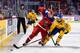 MONTREAL, QC - JANUARY 05: Yakov Trenin #25 of Team Russia and Rasmus Dahlin #8 of Team Sweden chase after the puck during the 2017 IIHF World Junior Championship bronze medal game at the Bell Centre on January 5, 2017 in Montreal, Quebec, Canada. (Photo