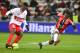 Toulouse's French forward Yaya Sanogo (L) vies with Nice's Ivorian midfielder Jean Michael Seri during the French L1 football match Nice(OGCN) vs Toulouse (TFC) on February 3, 2018 at the 'Allianz Riviera Stadium' in Nice. / AFP PHOTO / YANN COATSALIOU