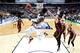 DALLAS, TX - MARCH 15: Lonnie Walker IV #4 of the Miami Hurricanes goes up for a shot against Cameron Krutwig #25 of the Loyola Ramblers in the first round of the 2018 NCAA Men's Basketball Tournament at American Airlines Center on March 15, 2018 in Dall