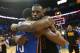 OKLAHOMA CITY, OK - FEBRUARY 13: LeBron James #23 of the Cleveland Cavaliers and Paul George #13 of the Oklahoma City Thunder hug after the game on February 13, 2018 at Chesapeake Energy Arena in Oklahoma City, Oklahoma. NOTE TO USER: User expressly ackn