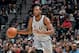 SAN ANTONIO, TX - JANUARY 13: Kawhi Leonard #2 of the San Antonio Spurs handles the ball against the Denver Nuggets on January 13, 2018 at the AT&T Center in San Antonio, Texas. NOTE TO USER: User expressly acknowledges and agrees that, by downloading an