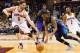 CLEVELAND, OH - FEBRUARY 24: Kemba Walker #15 of the Charlotte Hornets drives past Kevin Love #0 and Kyrie Irving #2 of the Cleveland Cavaliers during the second half at Quicken Loans Arena on February 24, 2016 in Cleveland, Ohio. The Cavaliers defeated t