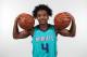 CHARLOTTE, NC- JUNE 22: Devonte' Graham #4 of the Charlotte Hornets poses for a portrait during the draft introductory press conference in Charlotte, North Carolina. NOTE TO USER: User expressly acknowledges and agrees that, by downloading and or using