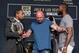 Dana White separates Daniel Cormier, left, and Jon Jones, right.