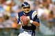 SAN DIEGO -1987: Dan Fouts #14 of the San Diego Chargers looks to pass during a 1987 NFL season game at Jack Murphy Stadium in San Diego, California. ( Photo by: Stephen Dunn/Getty Images)
