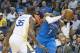 OKLAHOMA CITY, OK - NOVEMBER 22: Carmelo Anthony #7 of the Oklahoma City Thunder keeps the ball away from Kevin Durant #35 of the Golden State Warriors during the first half of a NBA game at the Chesapeake Energy Arena on November 22, 2017 in Oklahoma C