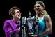 Williams celebrates a victory with Billie Jean King in 2014.