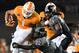 BRISTOL, TN - SEPTEMBER 10: Running back Jalen Hurd #1 of the Tennessee Volunteers is hit by rover Terrell Edmunds #22 of the Virginia Tech Hokies in the first half at Bristol Motor Speedway on September 10, 2016 in Bristol, Tennessee. Tennessee defeated