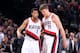 PORTLAND, OR - JANUARY 27: Meyers Leonard #11 talks with Evan Turner #1 of the Portland Trail Blazers during the game against the Memphis Grizzlies on January 27, 2017 at the Moda Center in Portland, Oregon. NOTE TO USER: User expressly acknowledges and a