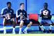 (from L) France's midfielder Paul Pogba, France's forward Antoine Griezmann, France's midfielder N'Golo Kante sit on the bench during a training session at the Glebovets stadium in Istra, some 70 km west of Moscow on July 12, 2018, ahead of their Russia 2