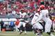 JACKSONVILLE, FL - DECEMBER 30: Lamar Jackson #8 of the Louisville Cardinals passes the ball in the first half of the TaxSlayer Bowl against the Mississippi State Bulldogs at EverBank Field on December 30, 2017 in Jacksonville, Florida. (Photo by Joe Robb