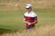 CARNOUSTIE, SCOTLAND - JULY 16: Justin Rose of England chips on the third hole during previews to the 147th Open Championship at Carnoustie Golf Club on July 16, 2018 in Carnoustie, Scotland. (Photo by Harry How/Getty Images)