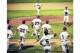Mayfield (top) and teammates rush to celebrate with Mayes after his perfect game.