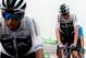 Great Britain's Christopher Froome (R) crosses the finish line to place 8th of the 17th stage of the 105th edition of the Tour de France cycling race, between Bagneres-de-Luchon and Saint-Lary-Soulan Col du Portet, southwestern France, on July 25, 2018. (