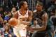 CHARLOTTE, NC - MARCH 28: JR Smith #5 of the Cleveland Cavaliers handles the ball against Marvin Williams #2 of the Charlotte Hornets on March 28, 2018 at Spectrum Center in Charlotte, North Carolina. NOTE TO USER: User expressly acknowledges and agrees