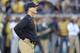 ANN ARBOR, MI - OCTOBER 07: Michigan head football coach Jim Harbaugh watches the warms ups prior to the start of the game against the Michigan State Spartans at Michigan Stadium on October 7, 2017 in Ann Arbor, Michigan. Michigan State defeated Michigan