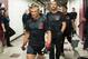 CHICAGO, IL - JULY 25: UFC bantamweight champion TJ Dillashaw warms up backstage with coach Duane Ludwig (R) before facing Renan Barao of Brazil in their UFC bantamweight championship bout during the UFC event at the United Center on July 25, 2015 in Chi