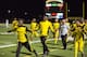 The Generals celebrate on the sidelines.