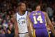 OAKLAND, CA - DECEMBER 22: Kevin Durant #35 of the Golden State Warriors and Brandon Ingram #14 of the Los Angeles Lakers walk up the court during the game on December 22, 2017 at ORACLE Arena in Oakland, California. NOTE TO USER: User expressly acknowle