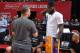 LAS VEGAS, NV - JULY 15: Tyronn Lue of the Cleveland Cavaliers and LeBron James of the Los Angeles Lakers greet each other during the 2018 Las Vegas Summer League on July 15, 2018 at the Thomas & Mack Center in Las Vegas, Nevada. NOTE TO USER: User expres
