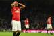 Manchester United's French striker Anthony Martial reacts after missing a chance during the English Premier League football match between Brighton and Hove Albion and Manchester United at the American Express Community Stadium in Brighton, southern Englan