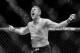 BRISBANE, AUSTRALIA - MARCH 20: (Editors note: Image has been converted to black and white.) Daniel Kelly celebrates his victory against Antonio Carlos Junior after their UFC Middleweight Bout at UFC Brisbane on March 20, 2016 in Brisbane, Australia. (P