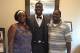 Zach Harrison, center, with mother Tracey and father Jim