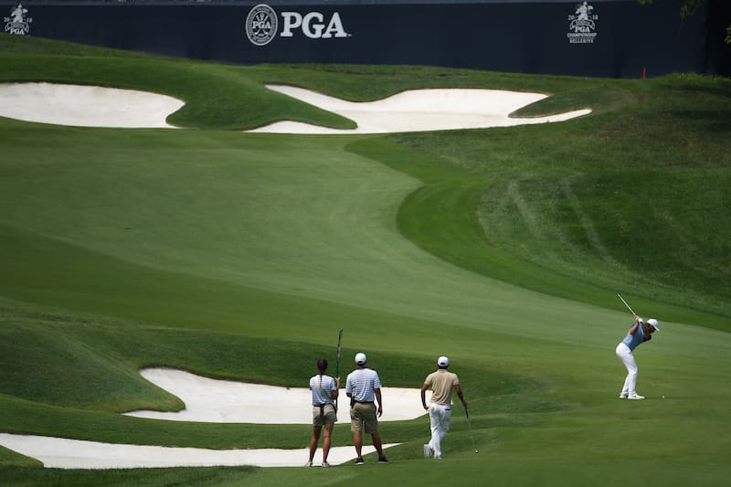 ST LOUIS, MO - AUGUST 12: Tommy Fleetwood of England plays a shot on the ninth hole during the final round of the 2018 PGA Championship at Bellerive Country Club on August 12, 2018 in St Louis, Missouri. (Photo by Ross Kinnaird/Getty Images)
