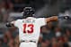 ATLANTA, GA - AUGUST 13: Ronald Acuna Jr. #13 of the Atlanta Braves reacts on the way to homeplate as he scores on a RBI single by Freddie Freeman #5 in the fifth inning against the Miami Marlins during game two of a doubleheader at SunTrust Park on Augu