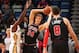 NEW ORLEANS, LA - JANUARY 22: Lauri Markkanen #24 passes the ball to Zach LaVine #8 of the Chicago Bulls during the game against the New Orleans Pelicans on January 22, 2018 at the Smoothie King Center in New Orleans, Louisiana. NOTE TO USER: User express