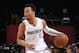 LAS VEGAS, NV - JULY 9: Jalen Brunson #13 of the Dallas Mavericks handles the ball against the Golden State Warriors during the 2018 Las Vegas Summer League on July 9, 2018 at the Thomas & Mack Center in Las Vegas, Nevada. NOTE TO USER: User expressly a